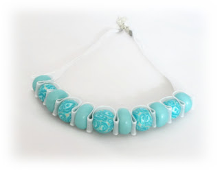 Turquoise Rose Ribbon Necklace handmade from polymer clay by Lottie Of London