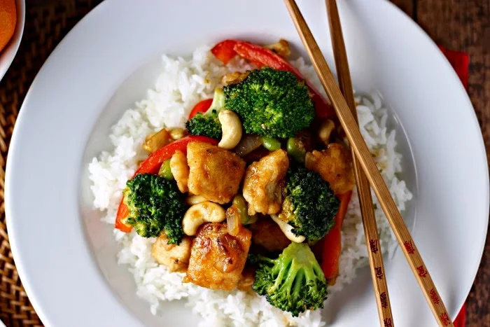 Spicy Honey Cashew Chicken with Sticky Rice for an Easy Chinese New Year Meal featuring Tai Pei® Appetizers
