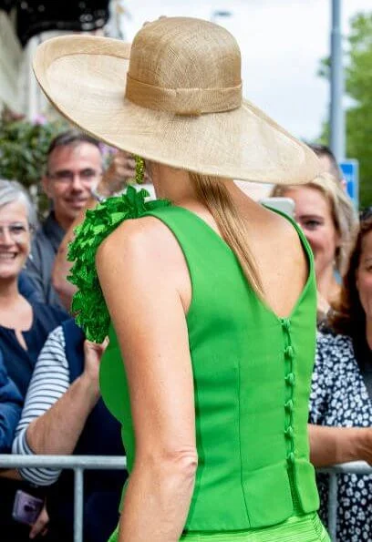 Queen Maxima wore Natan top and skirt, dress, Bodes and Bode juweliers earrings