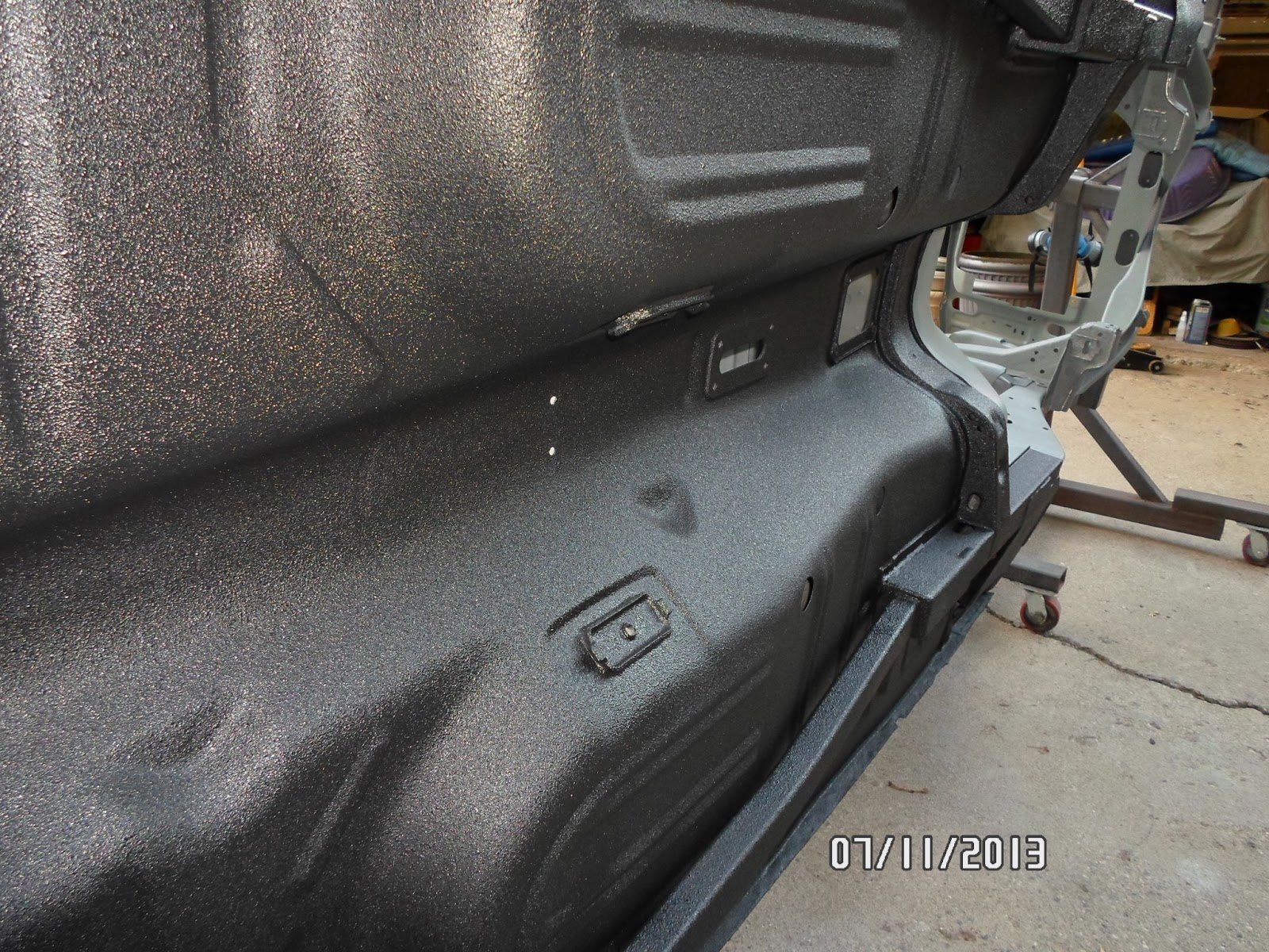 Night Mission Boss 302 Blog Finishing the Exterior Floor Raptor Spray