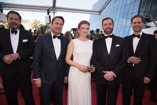 Princess Stephanie wore a white dress by Ralph Lauren at the opening night of Cannes Film Festival. The same dress had been worn by Crown Princess Victoria at Polar Music Prize ceremony in 2016