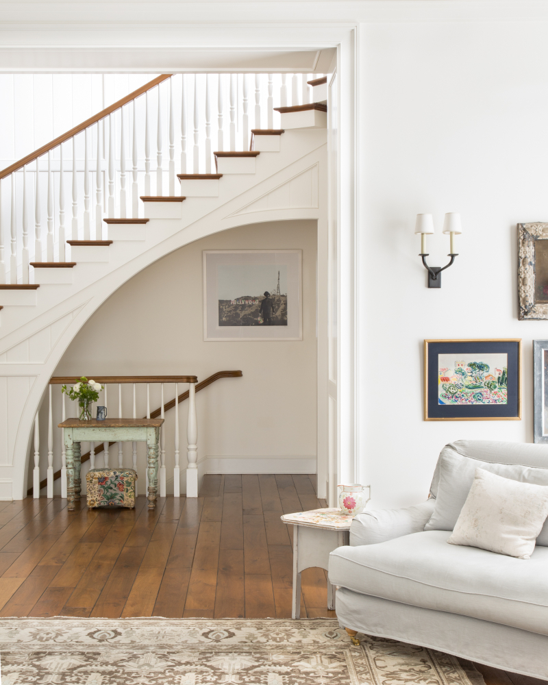 Giannetti Home Staircase and walnut hardwood floors in traditional home by Giannetti Home