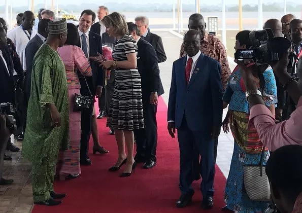 Queen Mathilde wore Natan floral print dress, Natan shoes an carried Natan clutch for visit Televic e-lab, SDGs and Unicorne Siona in Ghana