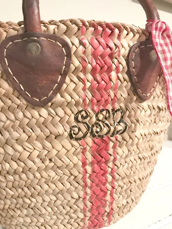 Market basket with a red stripe and monogram
