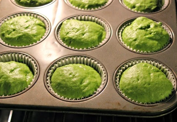 Spinach Cupcakes in pan baking