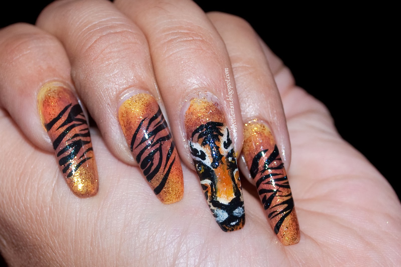 3. 30+ Eye-Catching Tiger Nail Designs for Wild and Fierce Look - wide 4
