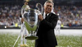 Ancelotti with the Champions League trophy after winning it for the third time with Real Madrid in 2014