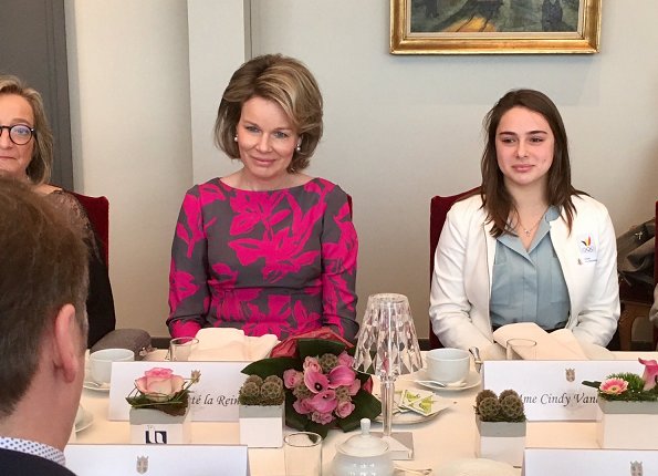 Queen Mathilde met with women from different sectors of Hainaut because of International Day of Women. Queen wore Dries Van Noten Coat and Dress