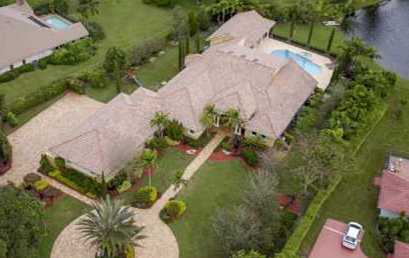 Recently sold by Marilyn: PARKLAND: 6 bedroom estate on lake in Cypress Head, a gated community