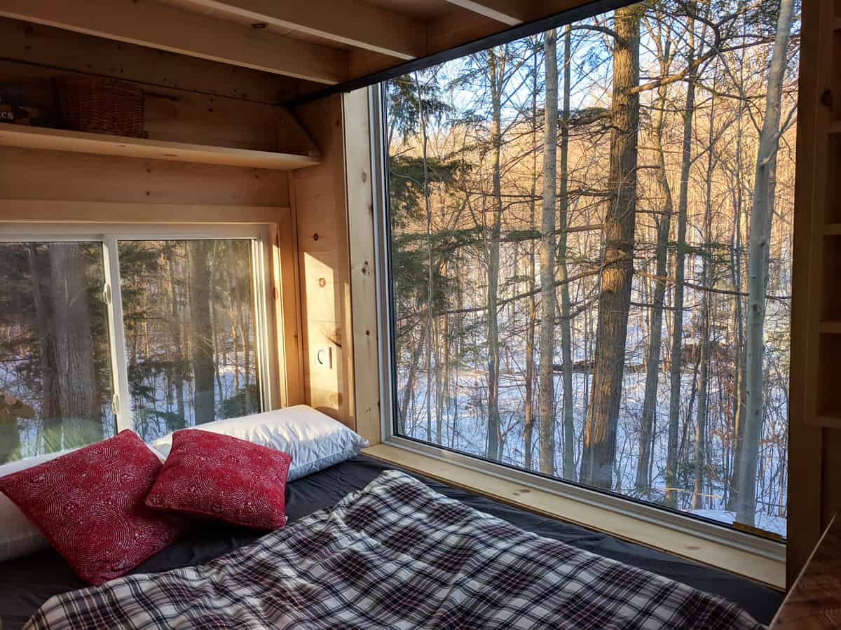 02-Lower-Bed-and-the-Forest-Cabinscape-Off-Grid-Cabin-Tiny-Home-Architecture-www-designstack-co