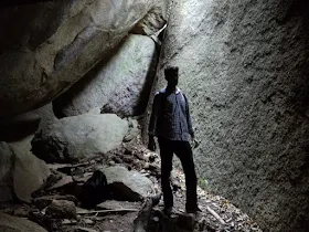 Riders resting and relaxing in a calmer, deeper area of the cave