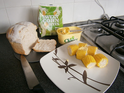 perfect meal ideal fresh bread and tasty sweetcorn with a dab of butter