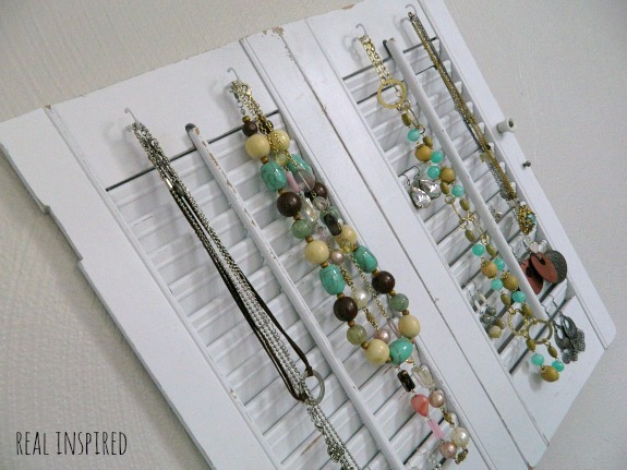 A tutorial for a DIY jewelry organizer made from old shutters!