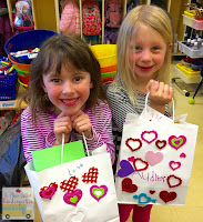 Valentine fun! Simple valentine bags equal gift bags and foam heart stickers from Michaels. This post also includes some simple valentine writing activities.  