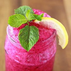 Dragon fruit juice tropical cocktail on Season with Spice with mint leaf and lemon
