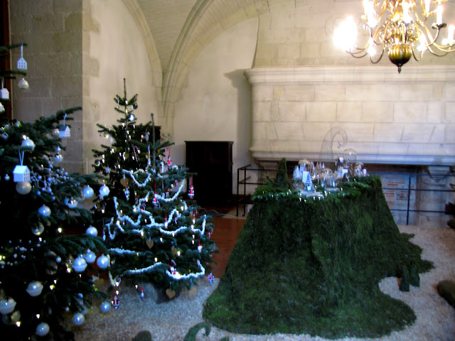 Chateau Azay-le-Rideau set out for Christmas with trees with white bobblws