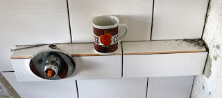 A little shelf for the shower cubicle A little shelf for the shower cubicle