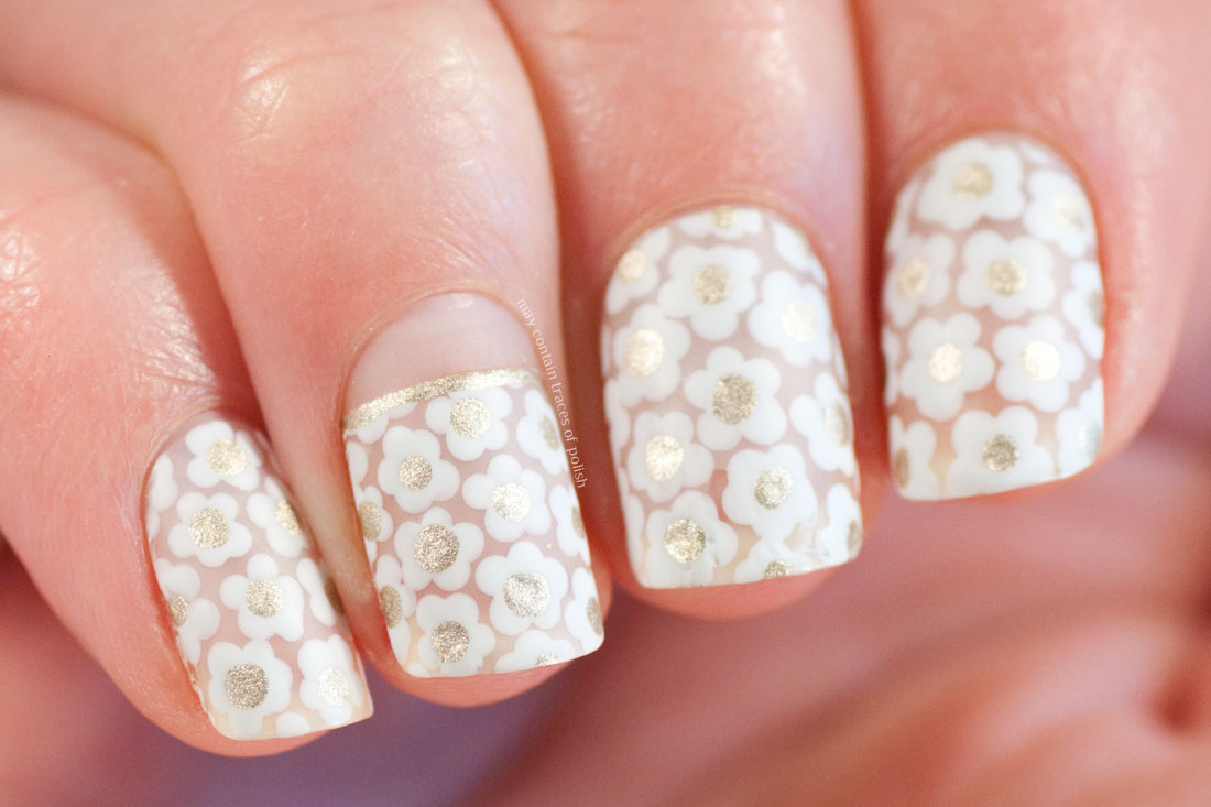 White Floral Negative Space Nail Art May contain traces of polish