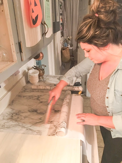 Create marble counter tops with contact paper