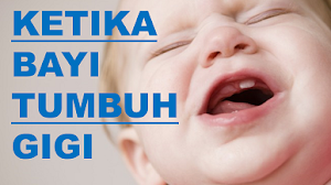 Mengatasi anak ketika sedang tumbuh gigi.