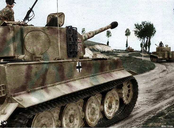 https://2.bp.blogspot.com/-Dz0a4dnpaQo/UkCbPlivNHI/AAAAAAAAwMA/RKaiav5qcwM/s1600/Tiger+I+Panzer+VI+101st+Heavy+Tank+Battalion+on+Road+316+to+Mogny+Normandy+France+June+7+1944+this+tank+captained+by+Unterscharfuhrer+SS+Ewald+Moli+under+Michael+Wittman.jpg