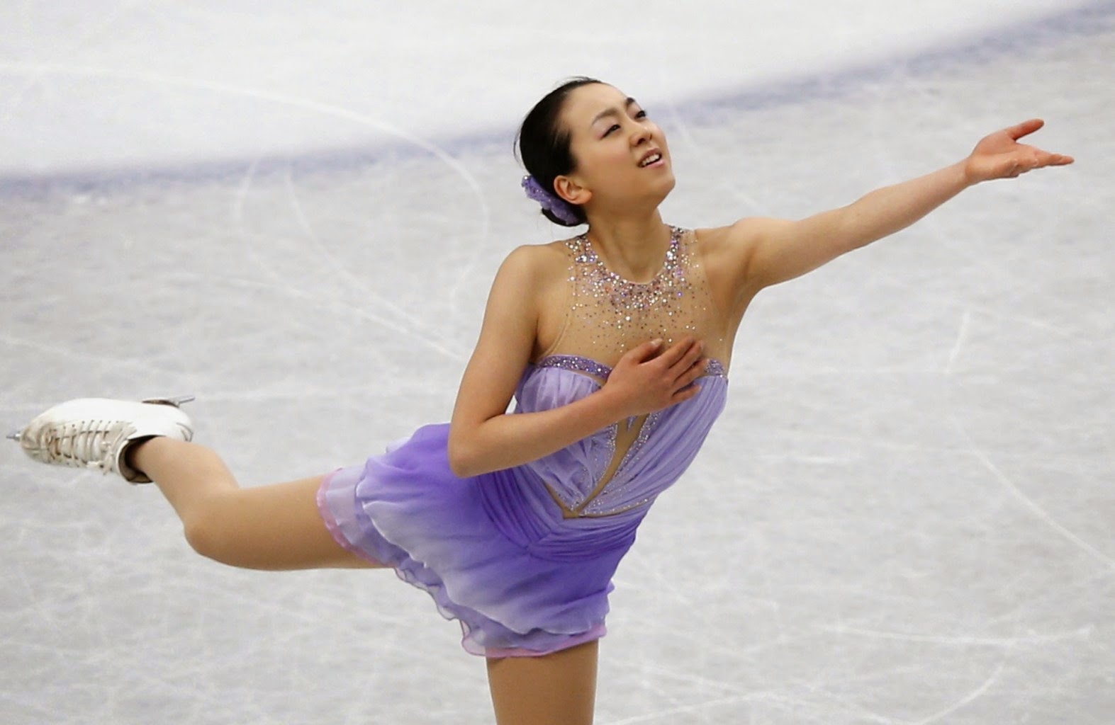Mao Asada (JPN) udfører sit korte program ved VM 2014 i kunstskøjteløb