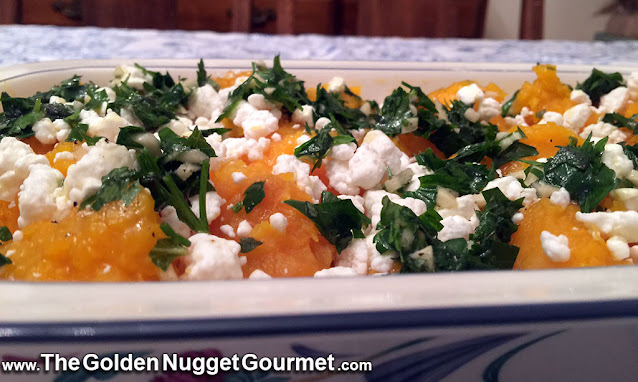 Roasted butternut squash topped with goat cheese and herb oil