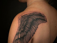 Angel Wings Tattoo On Upper Arm