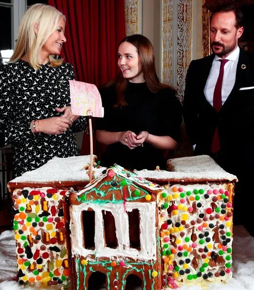 Princess Ingrid Alexandra, Sverre Magnus and Queen Sonja. Crown Princess Mette-Marit wore a white dove bird-print dress