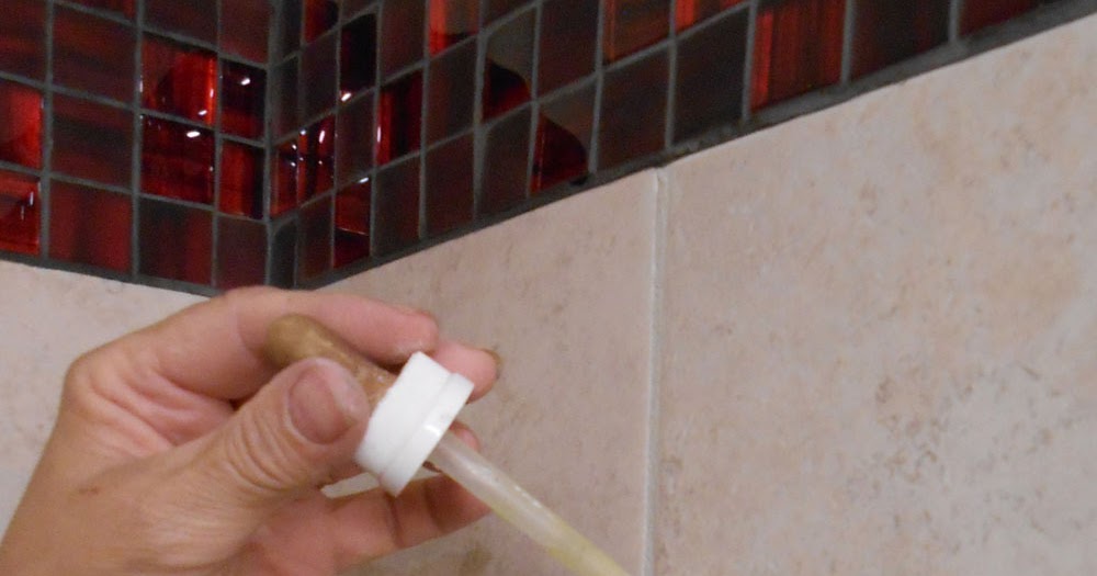 Taylor J Michaels Drilling a hole in ceramic tile