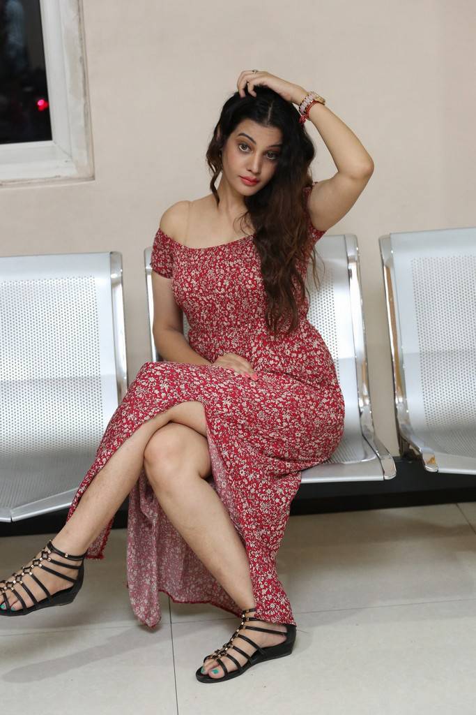 Diksha Panth Stills In Red Dress At MaayaMaal Pre Release Event
