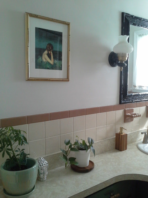 Vintage Bathroom Makeover Vintage Bathroom Makeover gold black light fixture bamboo mirror painting plants