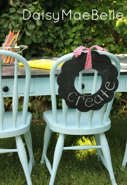 Children's aqua table and chairs makeover with chalkboard wreath by Daisy Mae Belle featured on I Love That Junk