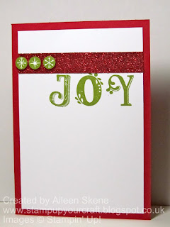 A Christmas card using Stampin Up's Broadsheet Alphabet for JOY and Red Glimmer paper