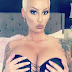 Curvy model Amber Rose displays bust in New backless and strapless bra