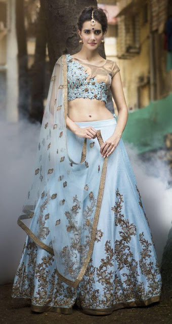 Featuring blue bridal lehenga with crafted handwork encrusted with crystal, sequin, beading and bugle beds with mesmerizing motives.