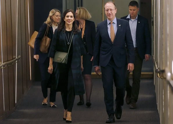 Crown Princess Mary wore a woven checked jacket by Baum und Pferdgarten. Crown Princess Mary is visiting Texas