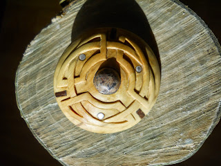 carved wooden kiltpin with inset stone