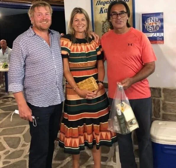 Bohemian striped multicolor length dress, round neck. King Willem-Alexander and Queen Maxima visited local tavernas in Greek island
