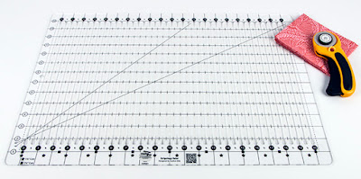 http://www.fatquartershop.com/creative-grids-non-slip-stripology-ruler