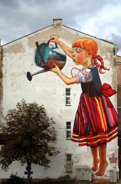 Polish Street Artist Natalia Rak Paints A New Mural On The Streets Of Bialystok For Folk On The Street. 5