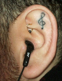 ear tattoos, tattooing
