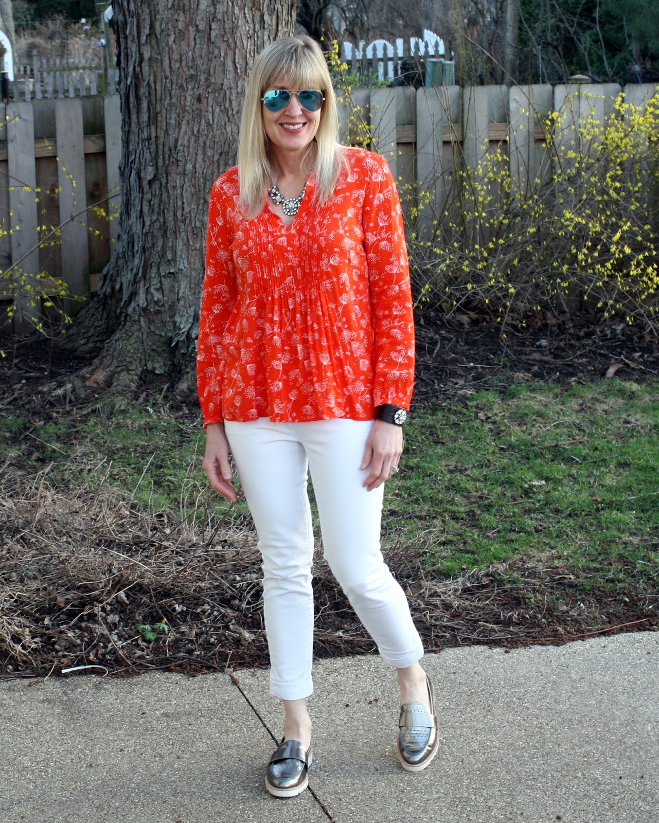 Red blouse with white jeans outfit