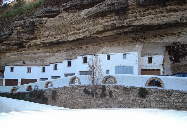 Setenil de las Bodegas is also one of the typical white villages of Andalucia - the houses are whitewashed every year in an effort to make the town as cool as possible. - The People In This Spanish Town Are Literally Living Under A Rock.