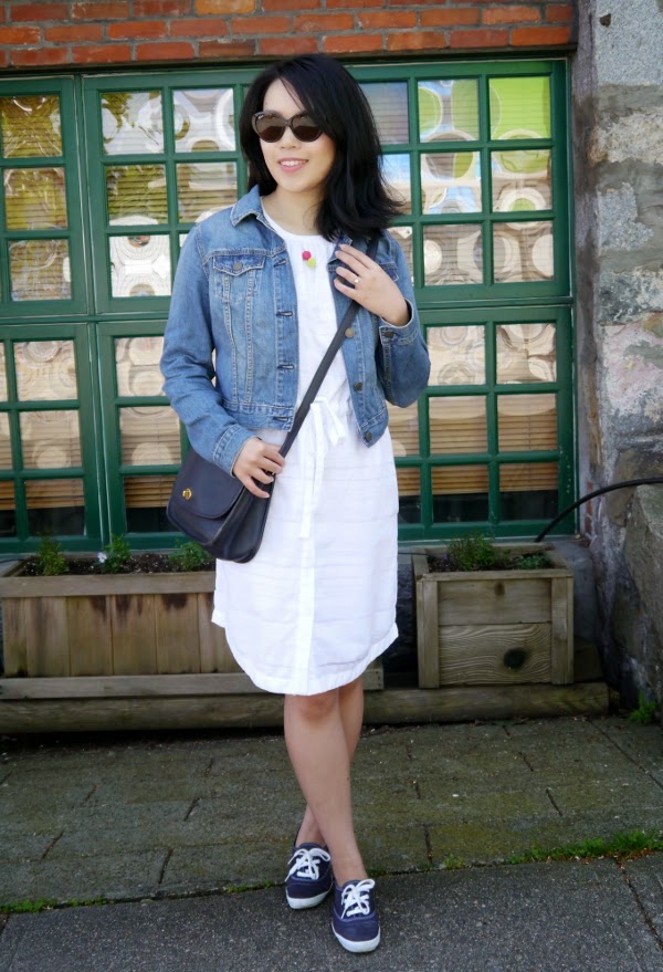 Casual outfit inspo: Cropped denim jacket, little white dress, crossbody bag, Keds sneakers