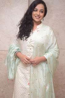 nitya menon at 100 days of love audio launch nitya menon at 100 days of love audio launch