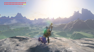 Link wearing the Fierce Deity armor and standing at the edge of the Great Plateau with Lynel gear, looking at a beautiful sunset