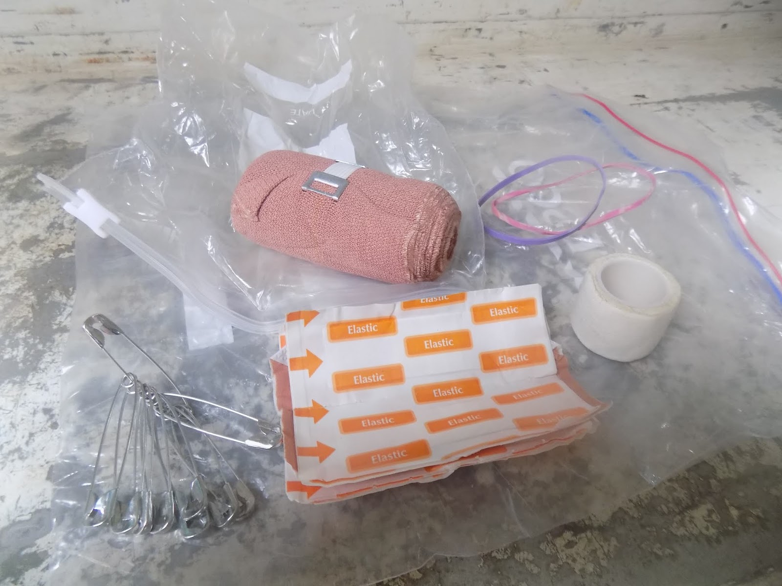 Outdoors Ireland Mini First Aid Kit (Out Of Bag, First Aid Done, Back