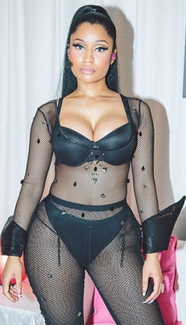 1 Photos: Nicki Minaj shows off curves in sheer performance outfit