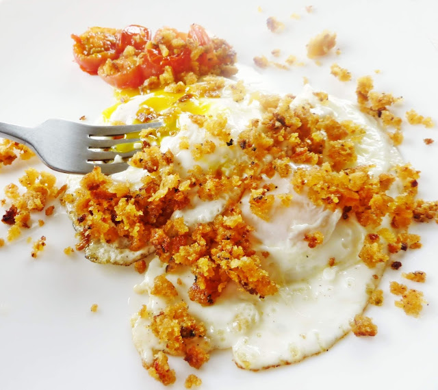 fried egg topped with crunchy breadcrumbs